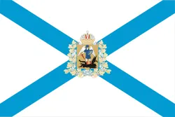 Flag of Arkhangelsk Oblast: a light blue saltire on white with the oblast's coat of arms at the centre