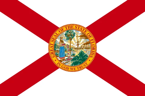Flag of Florida: a red saltire on white with the state seal at the centre