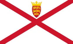 Flag of Jersey: a red saltire on white with the island's badge of three leopards under a crown